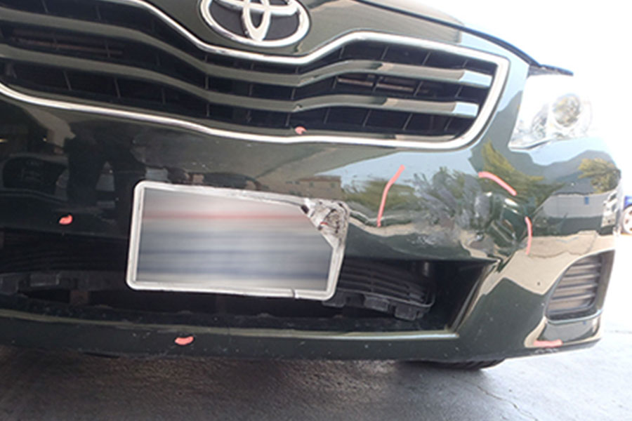 Black Toyota Corolla Before Repair