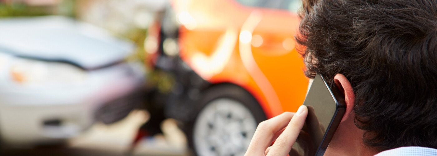 Driver Making Phone Call After Accident